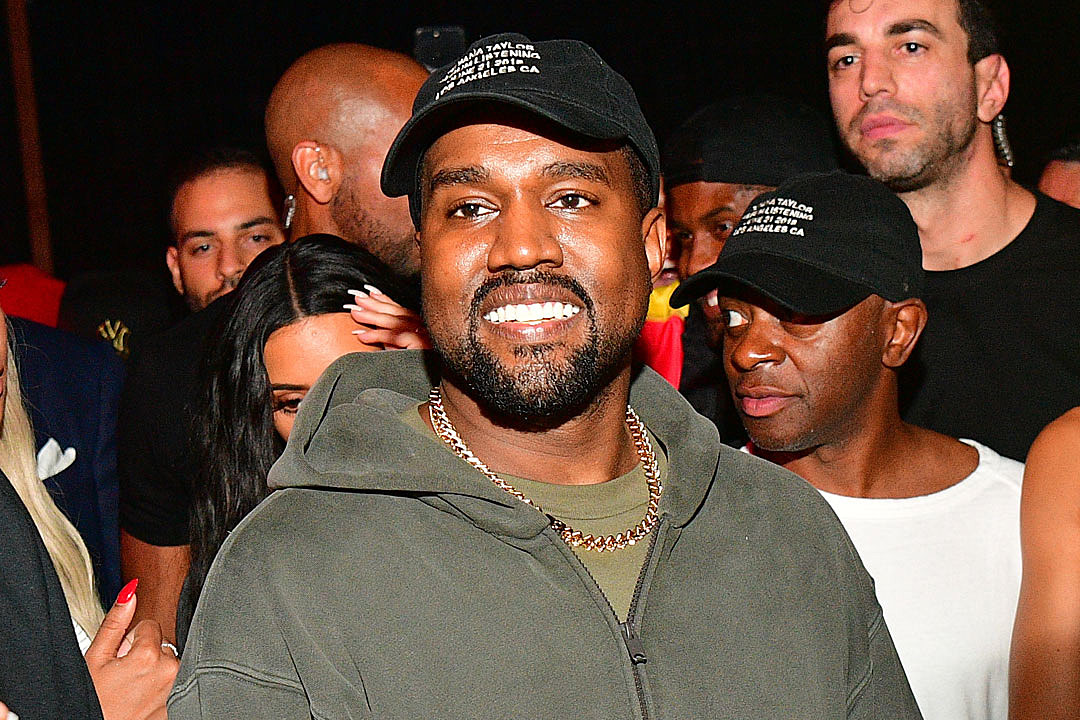 Kanye West Wears Massive Yeezy Slippers in Hilarious Response to
Haters