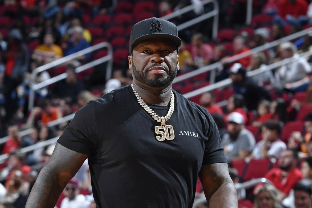 50 Cent attends the game between the Phoenix Suns and the Houston Rockets on March 16, 2022 at the Toyota Center in Houston, Texas.
